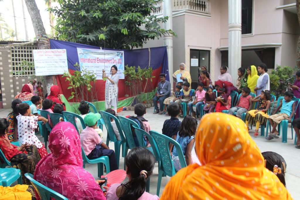 giving trees to the pre school children.jpg